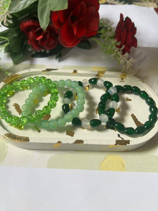 "Vibrant green beaded bracelets – perfect for your Azadi style!" Pack of 4